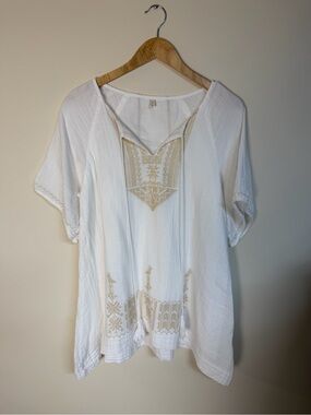 Bohemian-style white cotton peasant mini dress